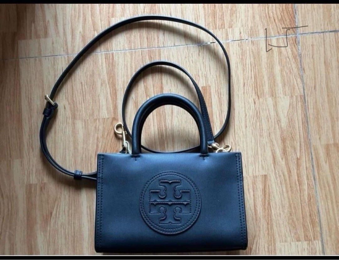 Tory Burch Mini Ella Bio Tote(Black) (Category: Luxury Bags & Wallets) located in Antipolo. Submitted by chaelvin29 (Listing ID 1354895011, Image 1). Description: 🌸Personal Preloved🌸 Tory Burch Mini Ella Bio Tote(Black) Height: 4.9” (12.5cm); length: 7.3” (18.5cm); depth: 2.8” (7cm) Outer shell: BioFabbrica Bio-Tex™ (64% USDA-certified bio-based content) Cotton herringbone lining Bridge with magnetic snap closure; snaps on gussets Top handles w