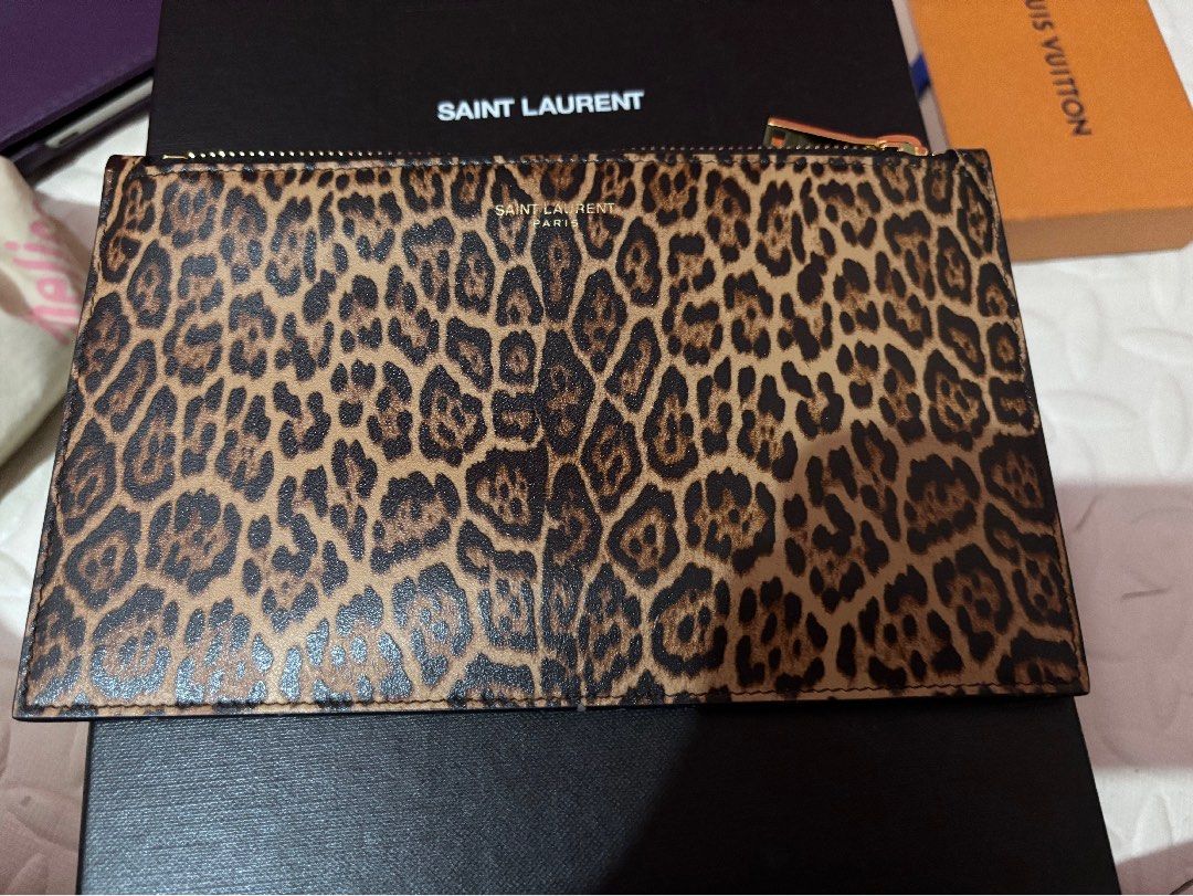 YSL pouch (Category: Luxury Bags & Wallets) located in Quezon City. Submitted by sassy1816 (Listing ID 1354725675, Image 1). Description: used onced .
