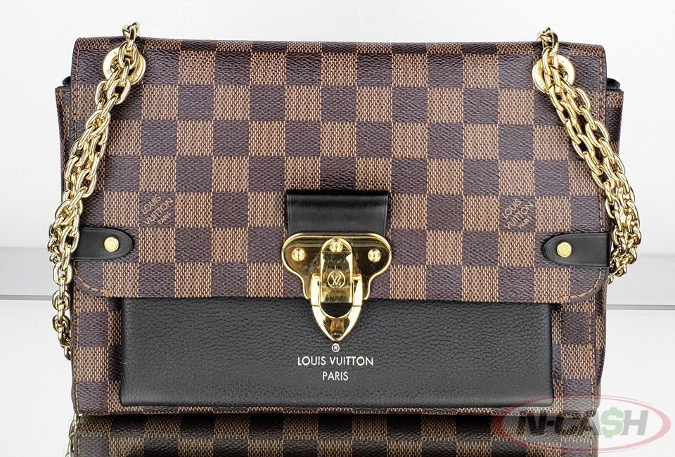 Authentic Louis Vuitton Vavin Damier Ebene Chain Bag (Category: Luxury Bags & Wallets) located in Quezon City. Submitted by luxury_by_n-cash (Listing ID 1354941271, Image 3). Description: N-Cash Pawnshop "Instant Cash for Bags, Watches, Cars, and Electronics" https://www.ncash-pawnshop-philippines.com/ Louis Vuitton Vavin Damier Ebene Canvas Black PM Bag PRE-OWNED Brand: LOUIS VUITTON Measures: 10" L x 7" H x 3.5" D (approx) 12" Double Strap Drop