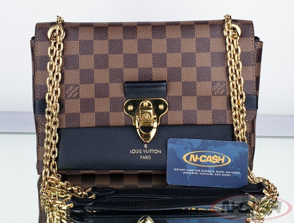 Authentic Louis Vuitton Vavin Damier Ebene Chain Bag (Category: Luxury Bags & Wallets) located in Quezon City. Submitted by luxury_by_n-cash (Listing ID 1354941271, Image 1). Description: N-Cash Pawnshop "Instant Cash for Bags, Watches, Cars, and Electronics" https://www.ncash-pawnshop-philippines.com/ Louis Vuitton Vavin Damier Ebene Canvas Black PM Bag PRE-OWNED Brand: LOUIS VUITTON Measures: 10" L x 7" H x 3.5" D (approx) 12" Double Strap Drop