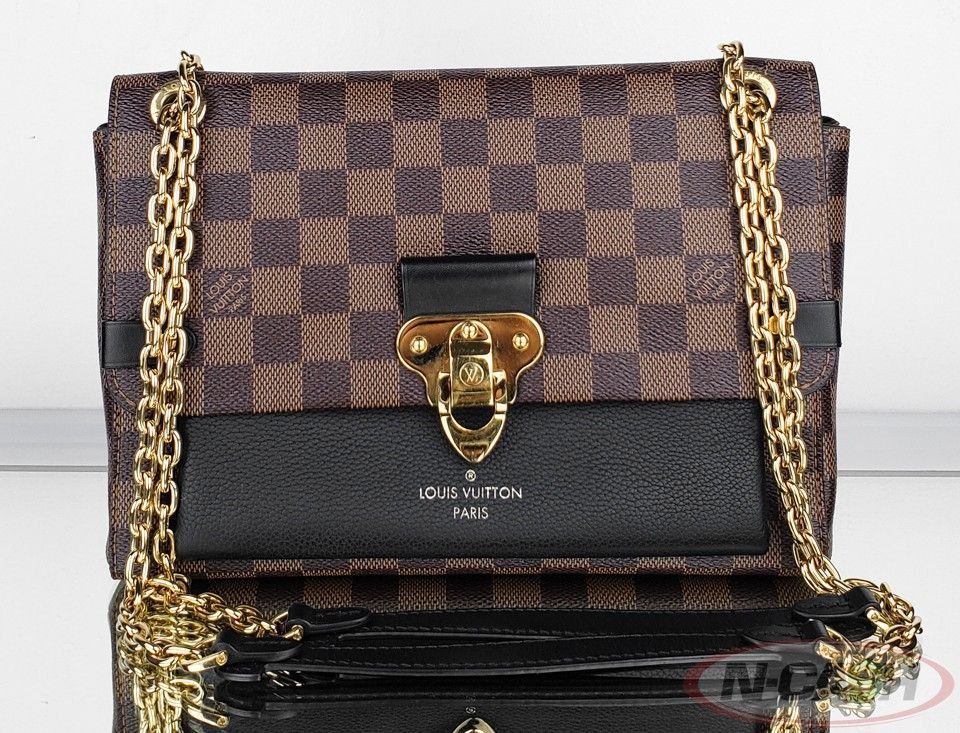 Authentic Louis Vuitton Vavin Damier Ebene Chain Bag (Category: Luxury Bags & Wallets) located in Quezon City. Submitted by luxury_by_n-cash (Listing ID 1354941271, Image 2). Description: N-Cash Pawnshop "Instant Cash for Bags, Watches, Cars, and Electronics" https://www.ncash-pawnshop-philippines.com/ Louis Vuitton Vavin Damier Ebene Canvas Black PM Bag PRE-OWNED Brand: LOUIS VUITTON Measures: 10" L x 7" H x 3.5" D (approx) 12" Double Strap Drop