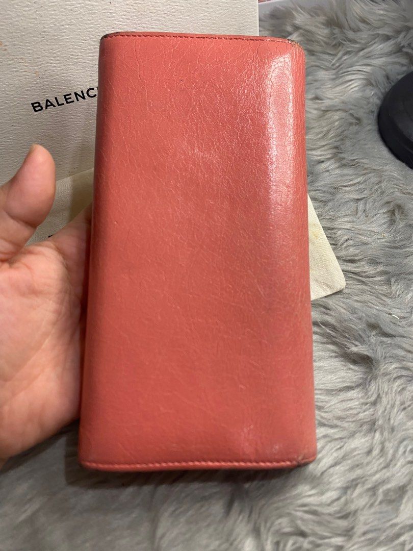 balenciaga wallet (Category: Luxury Bags & Wallets) located in Antipolo. Submitted by prelovedcloseta (Listing ID 1354961220, Image 2). Description: auth balenciaga wallet preloved minor rubs big studs wallet with box and dustbag estimated 10 card slots 3 bill compartments with coin compartment .