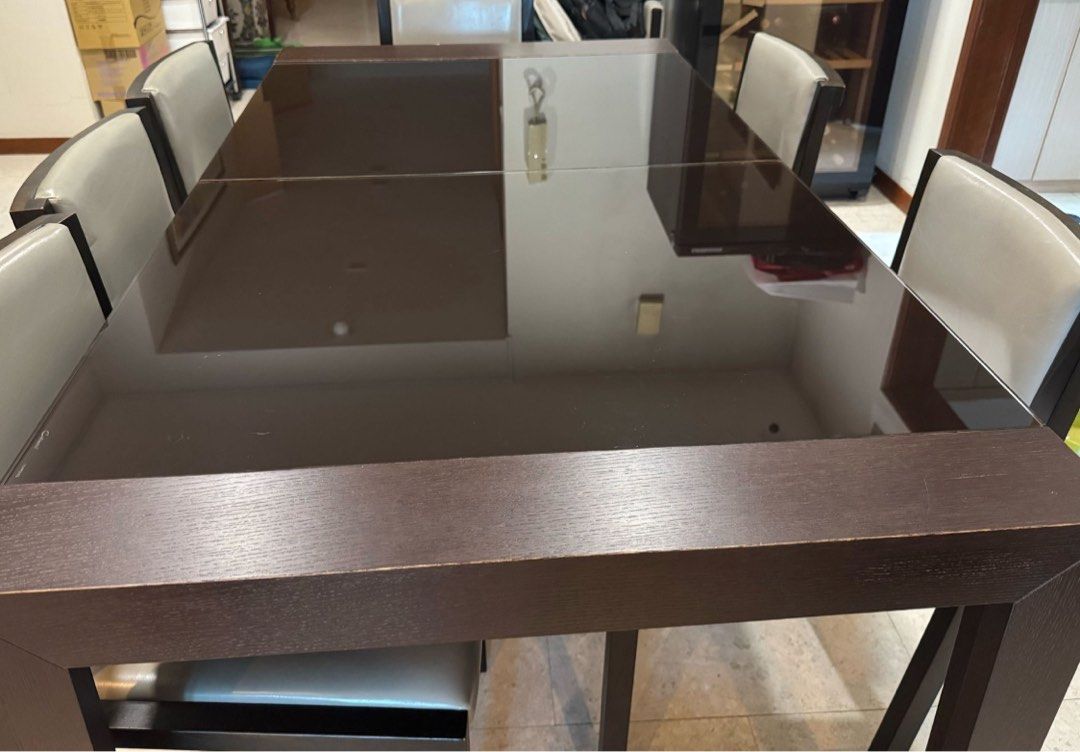 Dining Table (Category: Tables & Sets) located in Singapore. Submitted by audreysaw (Listing ID 1354914993, Image 2). Description: Calligaris Dinning table ( 6 seater ) Solid wood with tempered glass top .