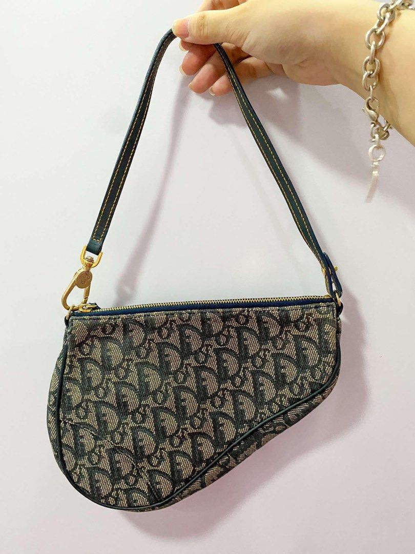 Dior Mini Saddle Bag (Category: Luxury Bags & Wallets) located in Caloocan City. Submitted by yvonclothes (Listing ID 1354917561, Image 2). Description: Vintage black Dior Mini saddle bag in the 2000s AUTHENTIC & VINTAGE - bought it from a shop in ig selling authentic vintage finds (@closetofcoco) - discontinued and other vintage shops selling it for higher price - only used once or twice good as new - 9/10 good condition RFS: decluttering.