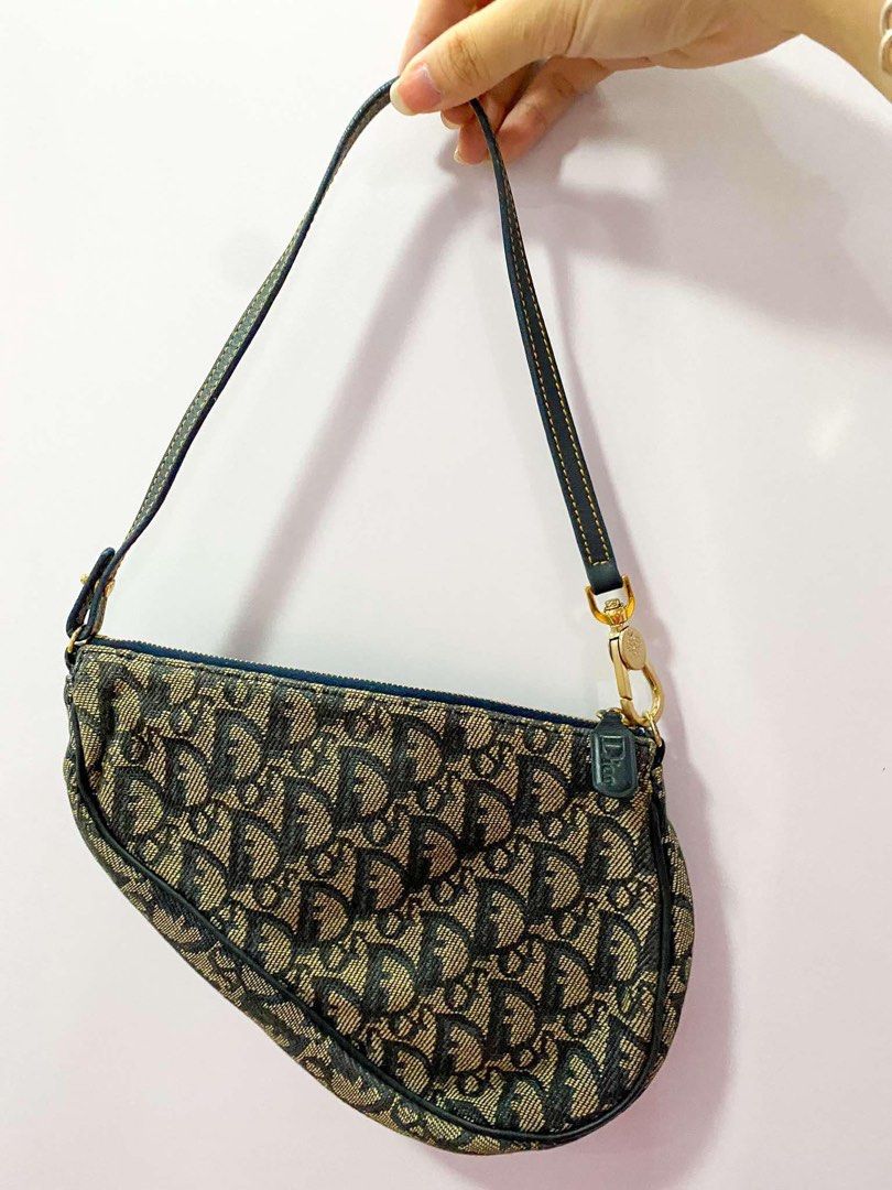 Dior Mini Saddle Bag (Category: Luxury Bags & Wallets) located in Caloocan City. Submitted by yvonclothes (Listing ID 1354917561, Image 3). Description: Vintage black Dior Mini saddle bag in the 2000s AUTHENTIC & VINTAGE - bought it from a shop in ig selling authentic vintage finds (@closetofcoco) - discontinued and other vintage shops selling it for higher price - only used once or twice good as new - 9/10 good condition RFS: decluttering.