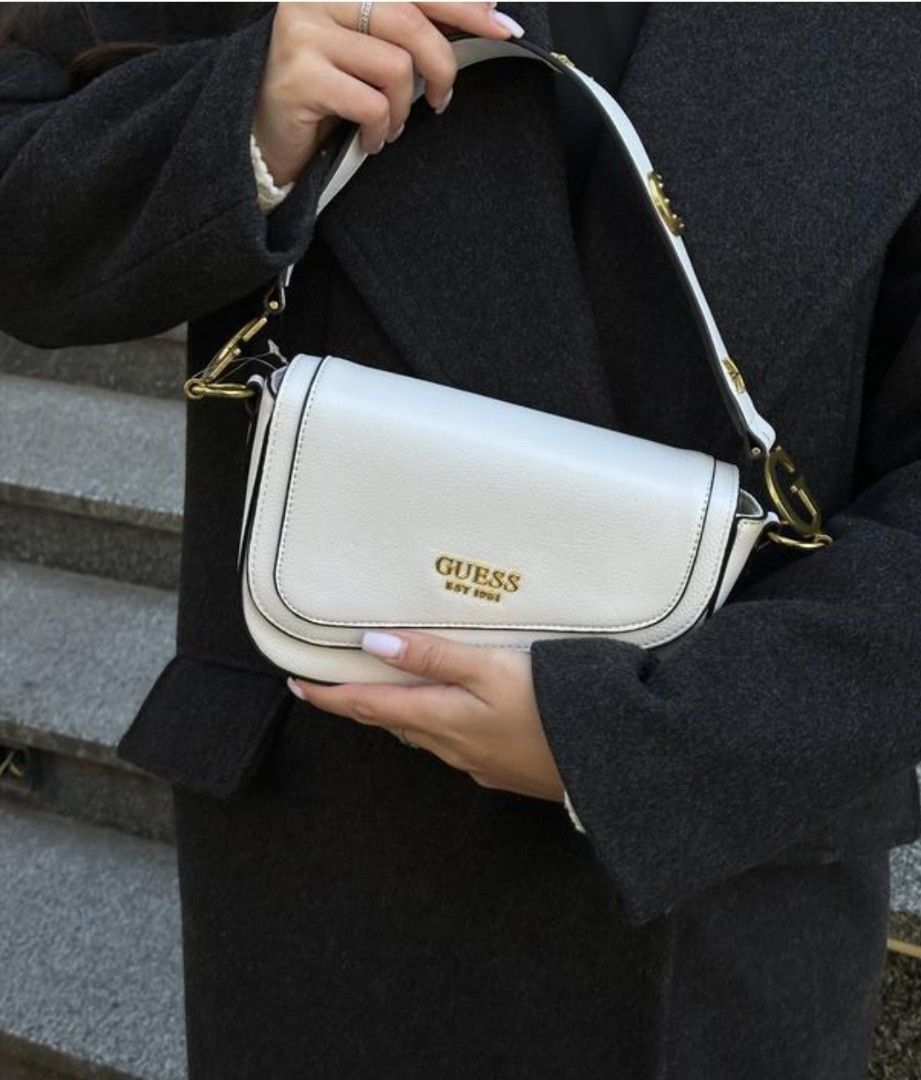 Guess women's shoulder bag (Category: Shoulder Bags) located in Cavite. Submitted by ariaaaaaaaaaa (Listing ID 1355001944, Image 1). Description: .