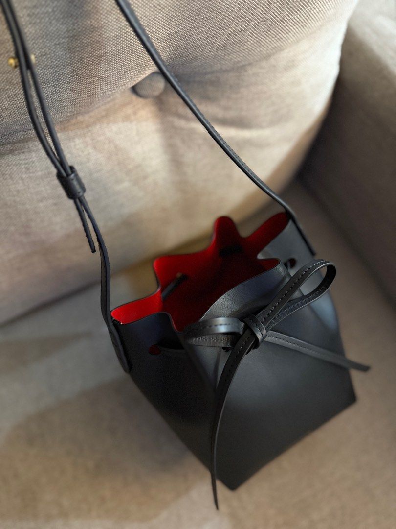 Mansur Gavriel Mini Mini Bucket Bag (Category: Luxury Bags & Wallets) located in Baliuag. Submitted by jophdsa (Listing ID 1354920573, Image 3). Description: with dust bag Like new, yung loob may maliit na scratch then minor hairlines sa bottom sa loob. pero clean po and no stains. ☺️ rfs: need funds.
