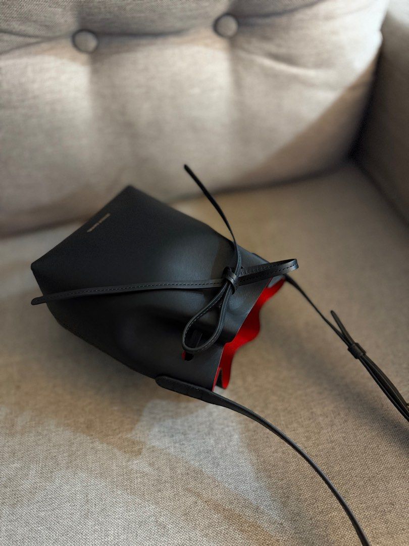 Mansur Gavriel Mini Mini Bucket Bag (Category: Luxury Bags & Wallets) located in Baliuag. Submitted by jophdsa (Listing ID 1354920573, Image 1). Description: with dust bag Like new, yung loob may maliit na scratch then minor hairlines sa bottom sa loob. pero clean po and no stains. ☺️ rfs: need funds.