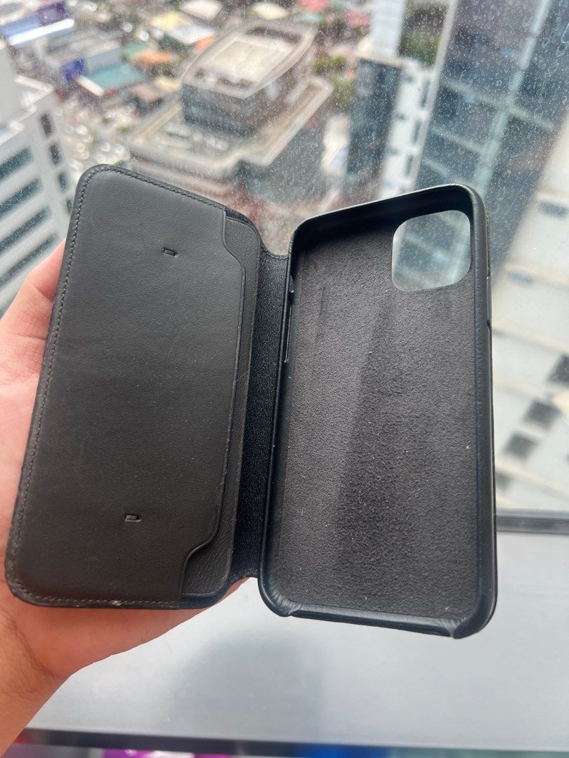Original iphone 11 pro leather folio case (Category: Cases & Sleeves) located in Quezon City. Submitted by pieair (Listing ID 1354962981, Image 2). Description: Barely used case na nakalagay lang sa box in the closet. Bought for 8890 many years ago. Really convenient to keep 1-2 cards with you without needing a wallet. Negotiable price, buyer handles shipping. .