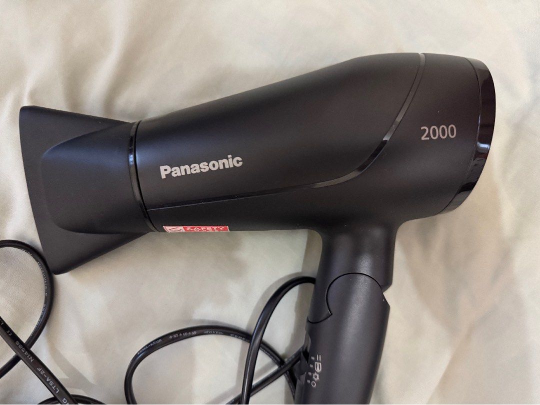 PANASONIC EH-ND65 COMPACT DESIGN HAIR DRYER 2000W (Category: Hair Accessories) located in Tarlac. Submitted by clxryxann (Listing ID 1355014144, Image 2). Description: Used few times only. Bought in HK. no box Key Features: * Powerful fast dry * PowerfulAirflow * Concentrator nozzle (11 mm) * Heat Protection and Strong Cool * Air pressure (w/out nozzle): 90 g * Weight: 330 g * Handle: Foldable * Actual watt: 2000W * Airflow settings: 3 airflow.