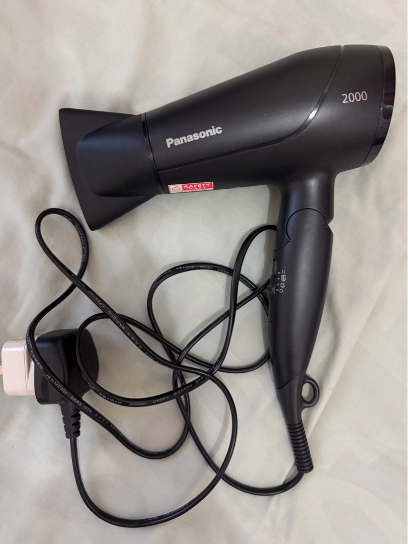PANASONIC EH-ND65 COMPACT DESIGN HAIR DRYER 2000W (Category: Hair Accessories) located in Tarlac. Submitted by clxryxann (Listing ID 1355014144, Image 1). Description: Used few times only. Bought in HK. no box Key Features: * Powerful fast dry * PowerfulAirflow * Concentrator nozzle (11 mm) * Heat Protection and Strong Cool * Air pressure (w/out nozzle): 90 g * Weight: 330 g * Handle: Foldable * Actual watt: 2000W * Airflow settings: 3 airflow.