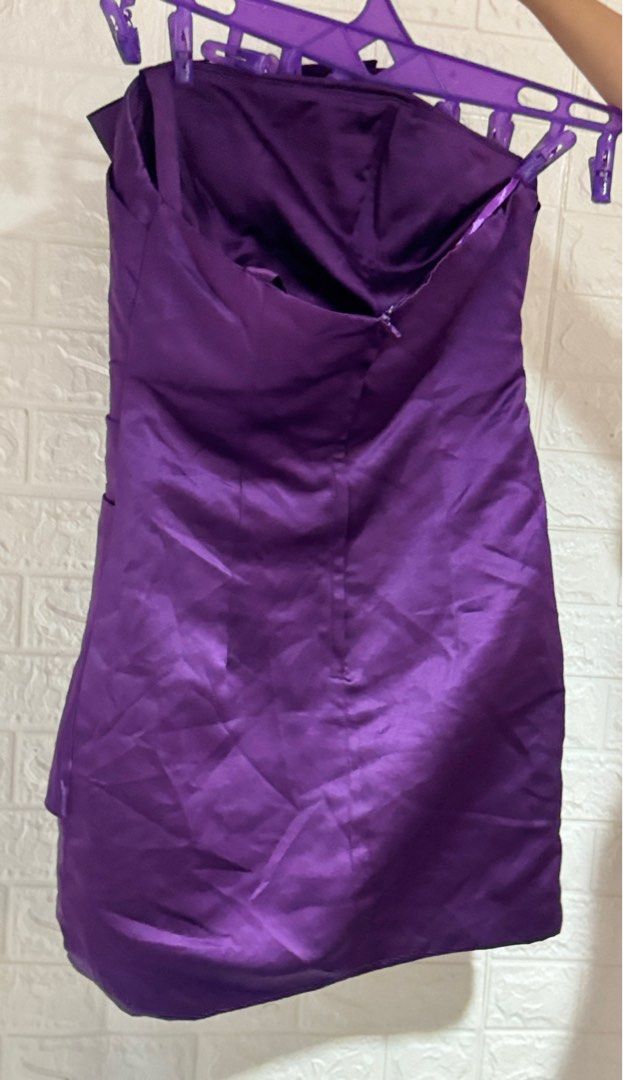 Purple Cocktail Dress (Category: Dresses) located in Antipolo. Submitted by etcph.101 (Listing ID 1354952764, Image 2). Description: Good condition L on Tag can fit to M-L back zip - pwede sa formal, wedding and other events May naka attached na strap sa isang side. pede nyo na lang po tanggalin or iadjust. Yung big ribbon natanggal. Kayo na lang po magkabit kung san nyo po gusto ilagay na side ☺️.