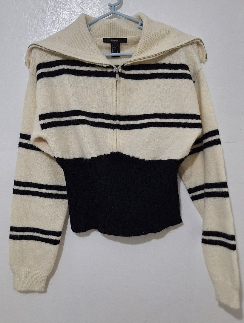 Forever 21 Striped Colorblock Combo Sweater Half Zip (Category: Coats, Jackets and Outerwear) located in Cainta. Submitted by fade1 (Listing ID 1355016398, Image 1). Description: A knit combo sweater featuring a colorblock design, partial striped pattern, half-zip front, funnel neck, dropped long sleeves, and ribbed trim. Used once. Excellent condition. Size small but can fit up to medium. MOP: GCASH.