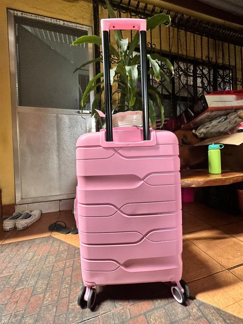 Travel Basic hard case luggage PINK (Category: Luggage) located in Manila. Submitted by geastoystoreatbp (Listing ID 1355019356, Image 3). Description: never used large TSA lock.