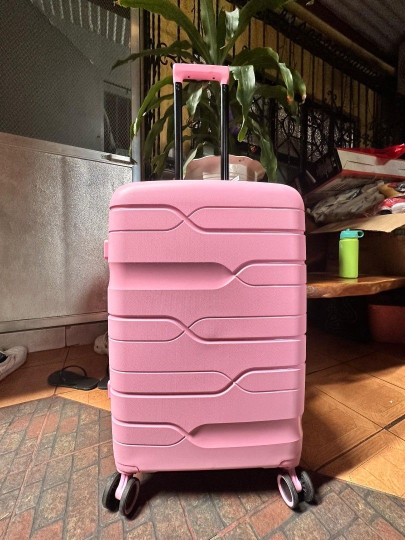 Travel Basic hard case luggage PINK (Category: Luggage) located in Manila. Submitted by geastoystoreatbp (Listing ID 1355019356, Image 1). Description: never used large TSA lock.