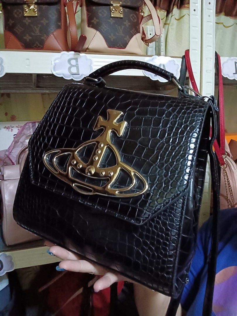 Vivienne Westwood ORB Crocodile Bag (Category: Luxury Bags & Wallets) located in Manila. Submitted by collectin (Listing ID 1354988396, Image 1). Description: .