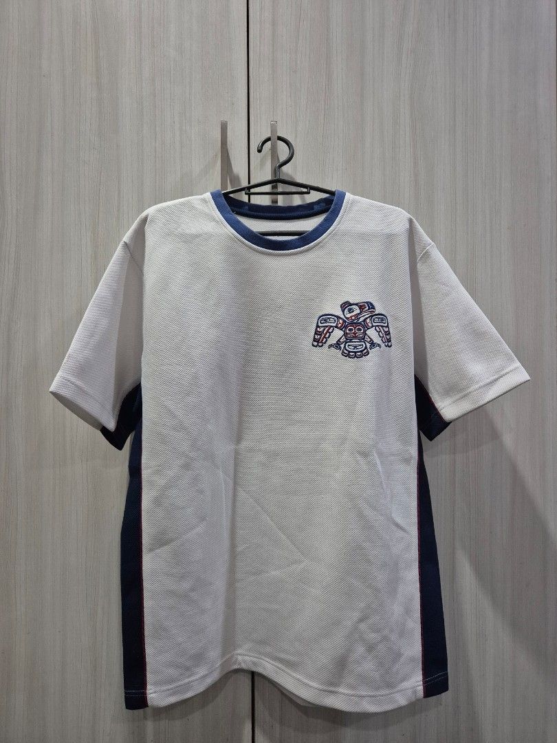 White dri-fit graphic jersey (Category: Tshirts & Polo Shirts ) located in Marikina City. Submitted by phorts (Listing ID 1354971317, Image 1). Description: fits M-L 28L x 21W no major issues.