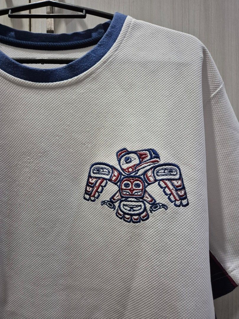 White dri-fit graphic jersey (Category: Tshirts & Polo Shirts ) located in Marikina City. Submitted by phorts (Listing ID 1354971317, Image 3). Description: fits M-L 28L x 21W no major issues.