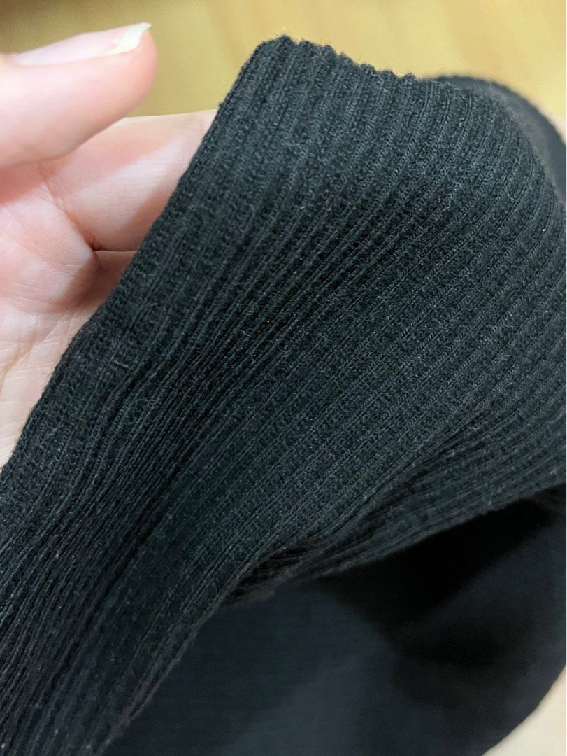 Black knitted high quality sleeveless top (Category: Sleeveless) located in Manila. Submitted by declutterwdmax (Listing ID 1355233829, Image 2). Description: - very high quality - body hugging - fits xs - small.