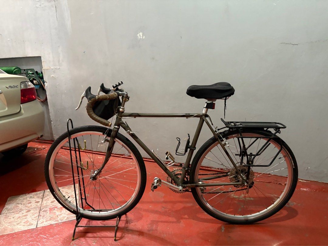 Bridgestone randonneur/touring build (Category: Bicycles) located in Manila. Submitted by takesandluna (Listing ID 1355137179, Image 1). Description: Frame: Bridgestone Steel Touring Frame with costumed Crankset: Velo Orange Grand Cru (50.4 BCD) Shifters: Dia-Compe Bar-End Shifters Derailleurs: Shimano (Front & Rear) Brakes: Dia-Compe Center Pull Brakes Wheelset: Rollc! Rims w/ Shimano Hubs Saddle: Brooks Leather Saddle (B17/Cambium) Handlebars: 