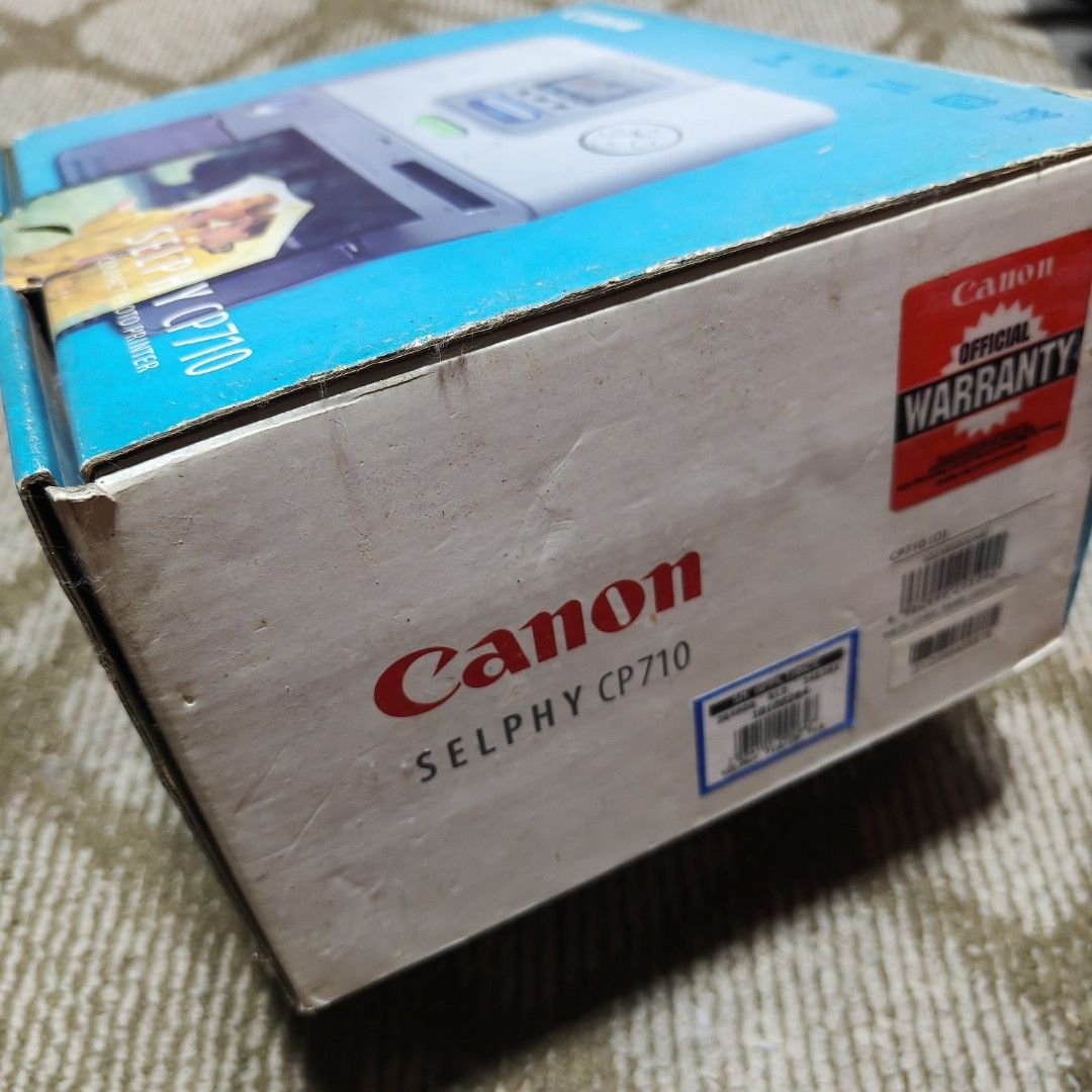 Canon Selphy CP710 (Category: Printers, Scanners & Copiers) located in Taguig. Submitted by sakiyasa (Listing ID 1355252775, Image 2). Description: Never been used. Only checked the inside and put it back again. Complete accessories with their plastic packagings..