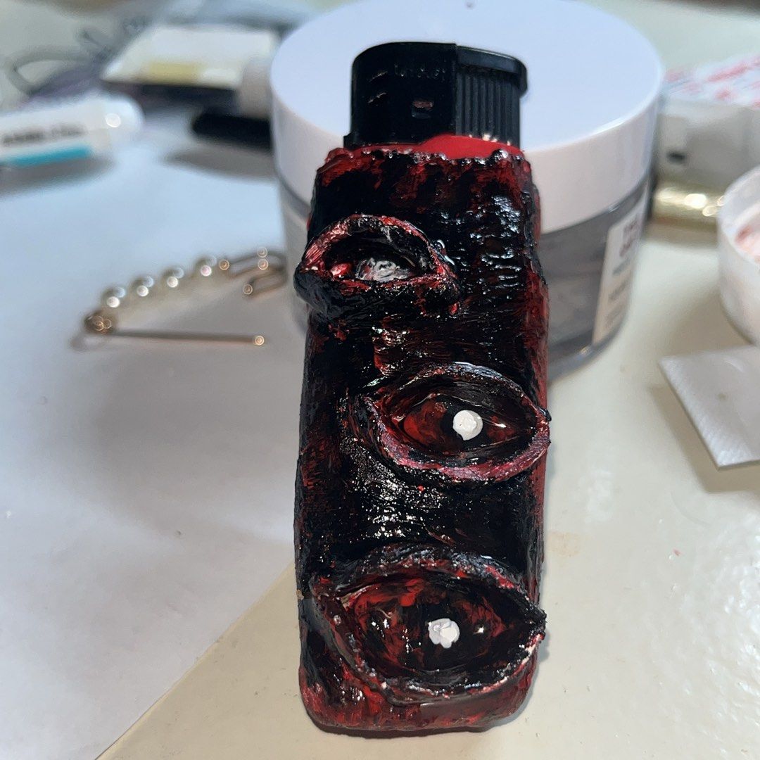 Handmade Eye Lighter Case (Category: Handmade Craft) located in Cavite. Submitted by heyitsmork (Listing ID 1355272633, Image 1). Description: wts lfb ph Handmade Air Dry Clay Eyeball Lighter Case - ₱120 (can fit to cricket lighter and normal ones) p.s can do customized (price may be depend on design) mop: gcash / bdo / maya mod: lalamove / j&t / sm dasma / sm molino loc: imus, cavite .