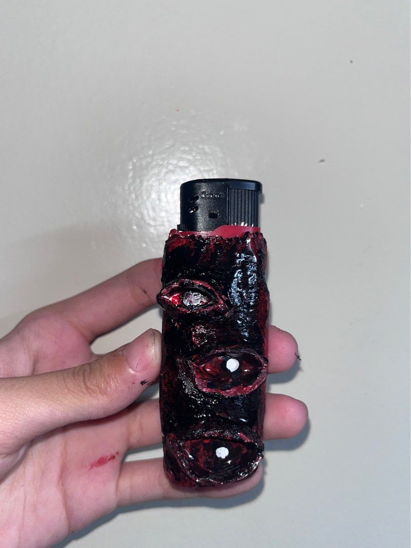 Handmade Eye Lighter Case (Category: Handmade Craft) located in Cavite. Submitted by heyitsmork (Listing ID 1355272633, Image 2). Description: wts lfb ph Handmade Air Dry Clay Eyeball Lighter Case - ₱120 (can fit to cricket lighter and normal ones) p.s can do customized (price may be depend on design) mop: gcash / bdo / maya mod: lalamove / j&t / sm dasma / sm molino loc: imus, cavite .