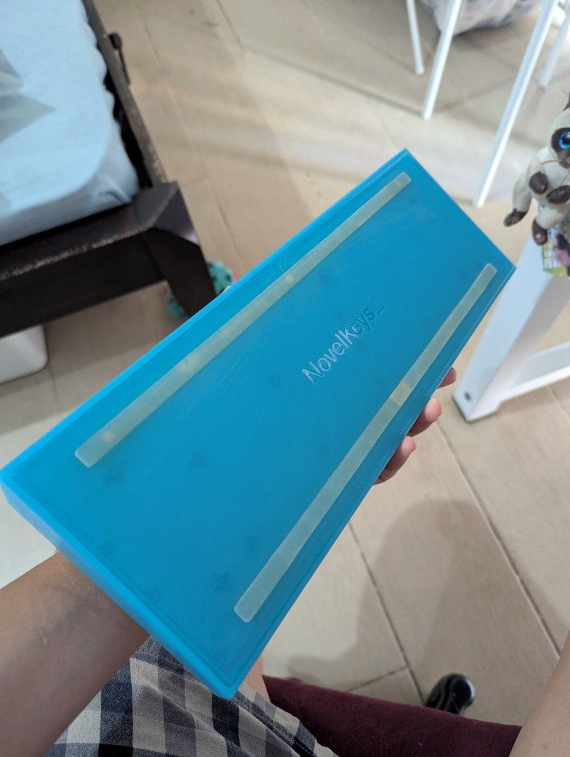 NK65ee Bluemen (Barebones) (Category: Computer Keyboard) located in Taguig. Submitted by ceilingfan328 (Listing ID 1355155940, Image 2). Description: Selling my NK65ee Barebones 65% keeb. No USB C Cable. Comes with the carrying case Works perfectly and is VIA compatible. Only issue is cosmetic: a crack on the top left corner (due to Novelkey's QA & manufacturing) I can throw in a clone of PBT Bento keycaps for P500.