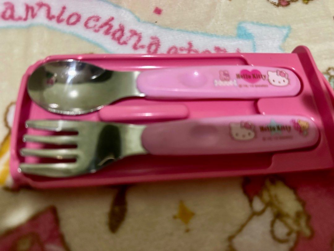 original hello kitty spoon and fork made in Japan (Category: Weaning & Toddler Feeding) located in Makati City. Submitted by reinboo_collection (Listing ID 1355107104, Image 2). Description: Authentic Hello Kitty spoon and fork set with case—super cute and bought from the Hello Kitty store in Japan! Perfect for collectors or everyday use!.