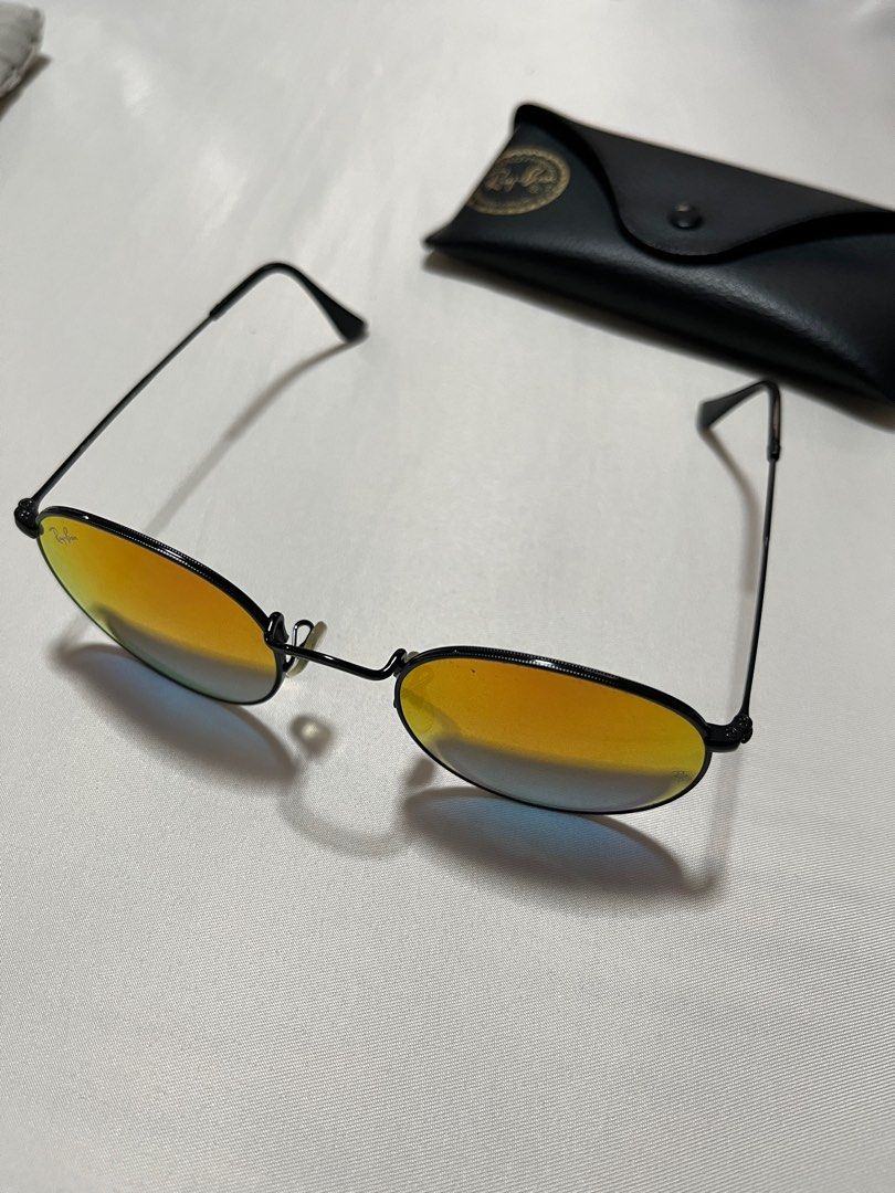 Rayban Round Lenses - Gradient Orange (Category: Sunglasses & Eyewear) located in Quezon City. Submitted by umsph (Listing ID 1355196861, Image 3). Description: Rayban Round Lenses - Gradient Orange Negotiable to best offer! Rfs: declutterring Rarely used, not my style FRAME SHAPE: Round FRAME COLOR: Polished Black FRAME MATERIAL: Metal TEMPLE COLOR: Black.