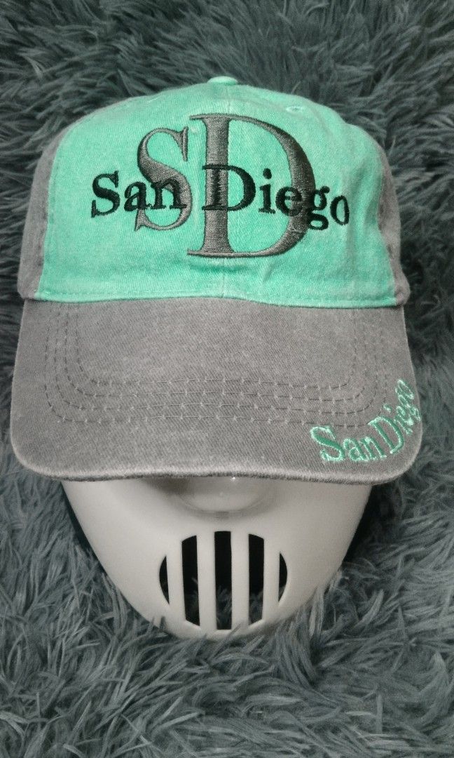 San Diego cap by lucky 7 USA (Category: Caps & Hats) located in Taguig. Submitted by goldthrifter (Listing ID 1355178462, Image 1). Description: excellent condition searchable color 2 tone green and denim gray embroided logo front ,side and upper brim velcro straps complete tags click to see more pictures and details no issues negotiable price if you buy any items bundle.