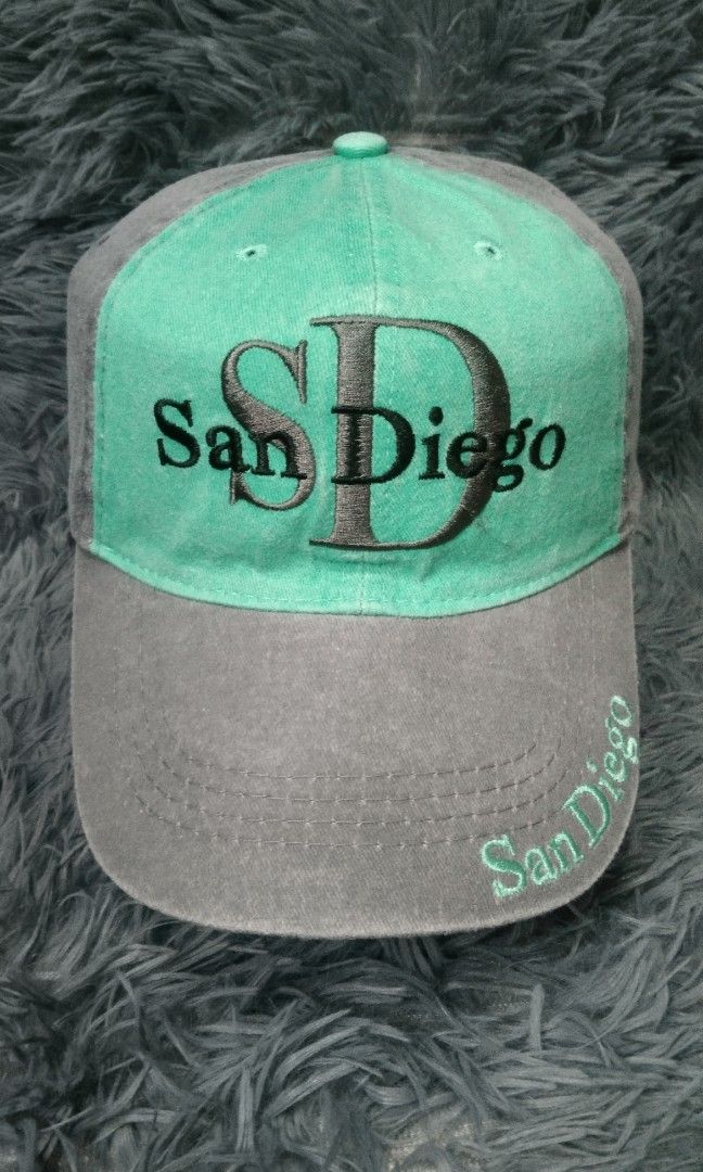 San Diego cap by lucky 7 USA (Category: Caps & Hats) located in Taguig. Submitted by goldthrifter (Listing ID 1355178462, Image 2). Description: excellent condition searchable color 2 tone green and denim gray embroided logo front ,side and upper brim velcro straps complete tags click to see more pictures and details no issues negotiable price if you buy any items bundle.