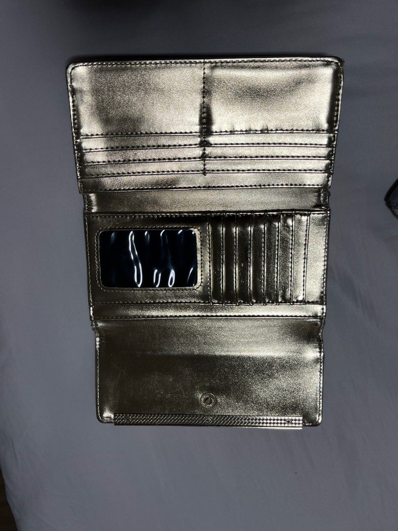 Steve Madden / Thailand / Kipling long wallet (Category: Wallets & Card holders) located in Quezon City. Submitted by umsph (Listing ID 1355199686, Image 3). Description: Misc Wallets for Php 500 each or Php 1000 for all! Prices also negotiable - all zippers intact 1. Steve Madden Floral Gold Wallet Purchased from store 2021 No issues 2. Elephant Genuine Leather Purchased from thailand boutique 2019 3. Kipling Grey Long Wallet - SOLD Pls manage e