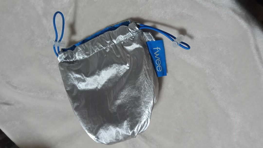 Fwee Silver Pouch (Category: Purses & Pouches) located in Bacolod City. Submitted by wembuys (Listing ID 1355403274, Image 2). Description: Fwee Silver Pouch.