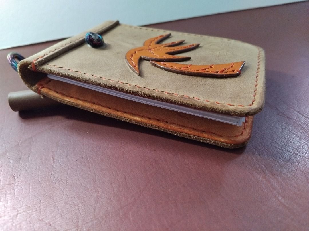 CoCo mini Note Pad (Category: Accessories) located in Singapore. Submitted by mceif117 (Listing ID 1355328767, Image 2). Description: A bespoke note pad for quick notes taking. Color : Hide Dimensions : 7.5 x 9.5cm SKU : CCM 109 Stock :Brown 2 Price : SGD38.00 All Nix HandMade Leather products are 100% handmade , hand stitch with full grain leather. No machines are involve during the production process. All Nix HandMade products comes with 1 year