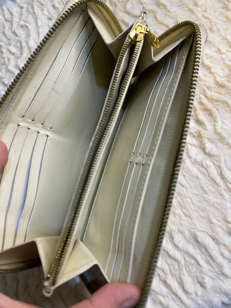 lv emilie wallet (Category: Luxury Bags & Wallets) located in Antipolo. Submitted by prelovedcloseta (Listing ID 1355332090, Image 3). Description: auth lv wallet preloved minor rubs vintage type of wallet 14 card slots 2-3 bill compartments with front zipper compartment.