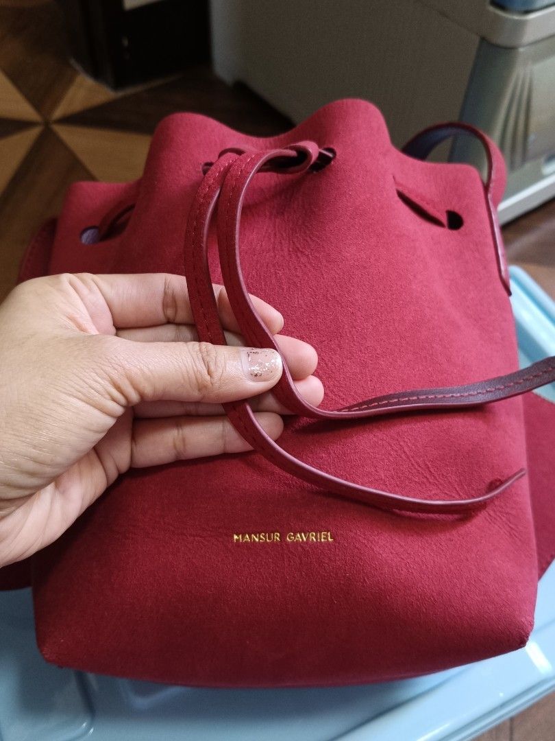 Mansur Gavriel (Category: Luxury Bags & Wallets) located in Batangas. Submitted by lynmejlight (Listing ID 1355376500, Image 1). Description: Super nice Ng material, color and body. With minimal sign of used sa rubber lining Ng strap pero hindi halata. See last 2 photos. Ang Ganda nya sa personal, promise😍.