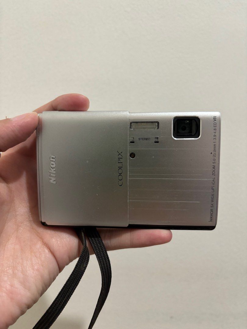 Nikon Coolpix S100 (Category: Cameras) located in Manila. Submitted by closetfairy_ (Listing ID 1355373308, Image 3). Description: FOR REPAIR: The screen turns on when charged, but the touch screen is not working. Can be used for parts in your camera repair. Available for lalamove and j&t.
