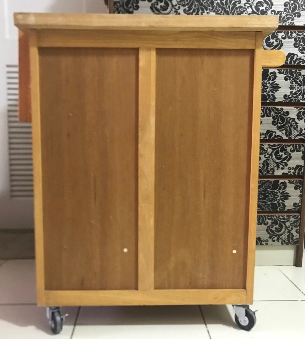 Pantry Table (Category: Shelves, Cabinets & Racks) located in Quezon City. Submitted by 79moving (Listing ID 1355292851, Image 2). Description: Movable Pantry Table Counter top size 27” X 19” inches Height w/out wheels 32”inches w/heavy duty 3”caster wheels.