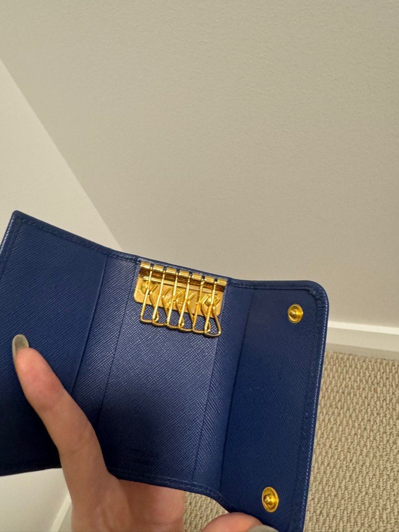 PRADA BLUE SAFFIANO KEY HOLDER - NEW (Category: Bags & Wallets) located in Concord. Submitted by randomassortments (Listing ID 1355401497, Image 3). Description: Never before used, in mint condition. This key holder is now discontinued, very convenient holds 6 keys and can also double up as card holder!.