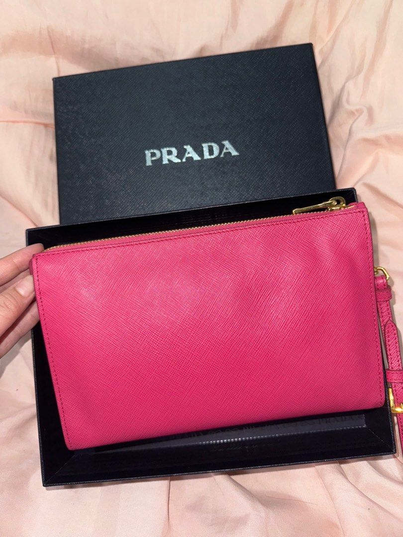 PRADA Saffiano Wristlet/Pouch (Category: Luxury Bags & Wallets) located in Pasay City. Submitted by missnayeon (Listing ID 1355433577, Image 2). Description: Condition: Brand new (10/10).