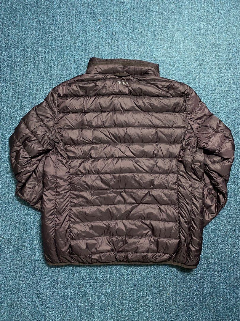 Tumi - Packable Jacket (Category: Coats, Jackets and Outerwear) located in Manila. Submitted by Thrifings (Listing ID 1355381826, Image 2). Description: Width 21 Length 24 .