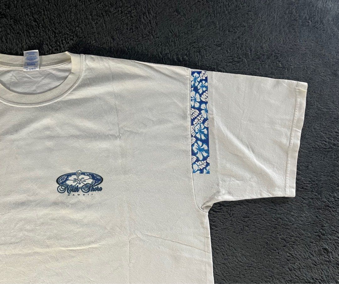 "Vintage "Hawaiian" Northshore Tee (Category: Tshirts & Polo Shirts ) located in Paranaque City. Submitted by arghbor_10 (Listing ID 1355415697, Image 3). Description: Vintage “Hawaiian” Northshore Tee Size: 2XL (29x25 Condition: Pristine Mine: 199 🔳 More items available on our profile, have a peek! 🔳 Color may vary due to lighting. 🔳 Feel free to message me directly for the issue and details. 🔳 Add extra fee for shipment. #ArghborNa.