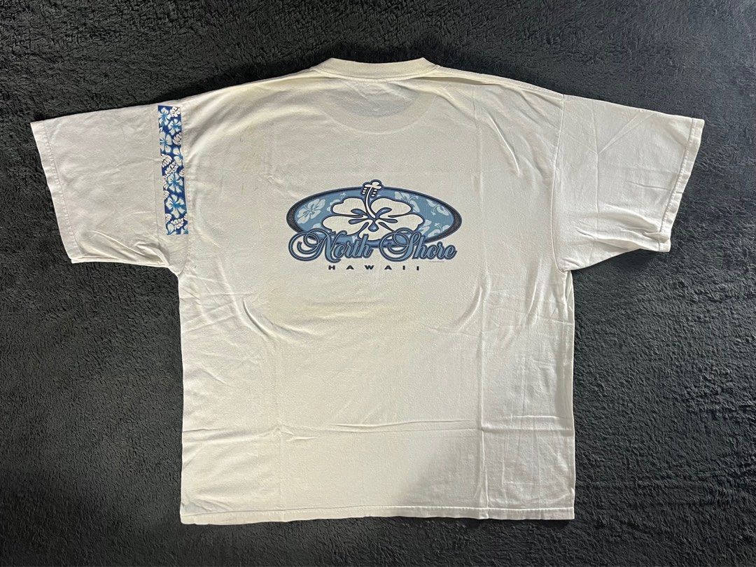 "Vintage "Hawaiian" Northshore Tee (Category: Tshirts & Polo Shirts ) located in Paranaque City. Submitted by arghbor_10 (Listing ID 1355415697, Image 1). Description: Vintage “Hawaiian” Northshore Tee Size: 2XL (29x25 Condition: Pristine Mine: 199 🔳 More items available on our profile, have a peek! 🔳 Color may vary due to lighting. 🔳 Feel free to message me directly for the issue and details. 🔳 Add extra fee for shipment. #ArghborNa.