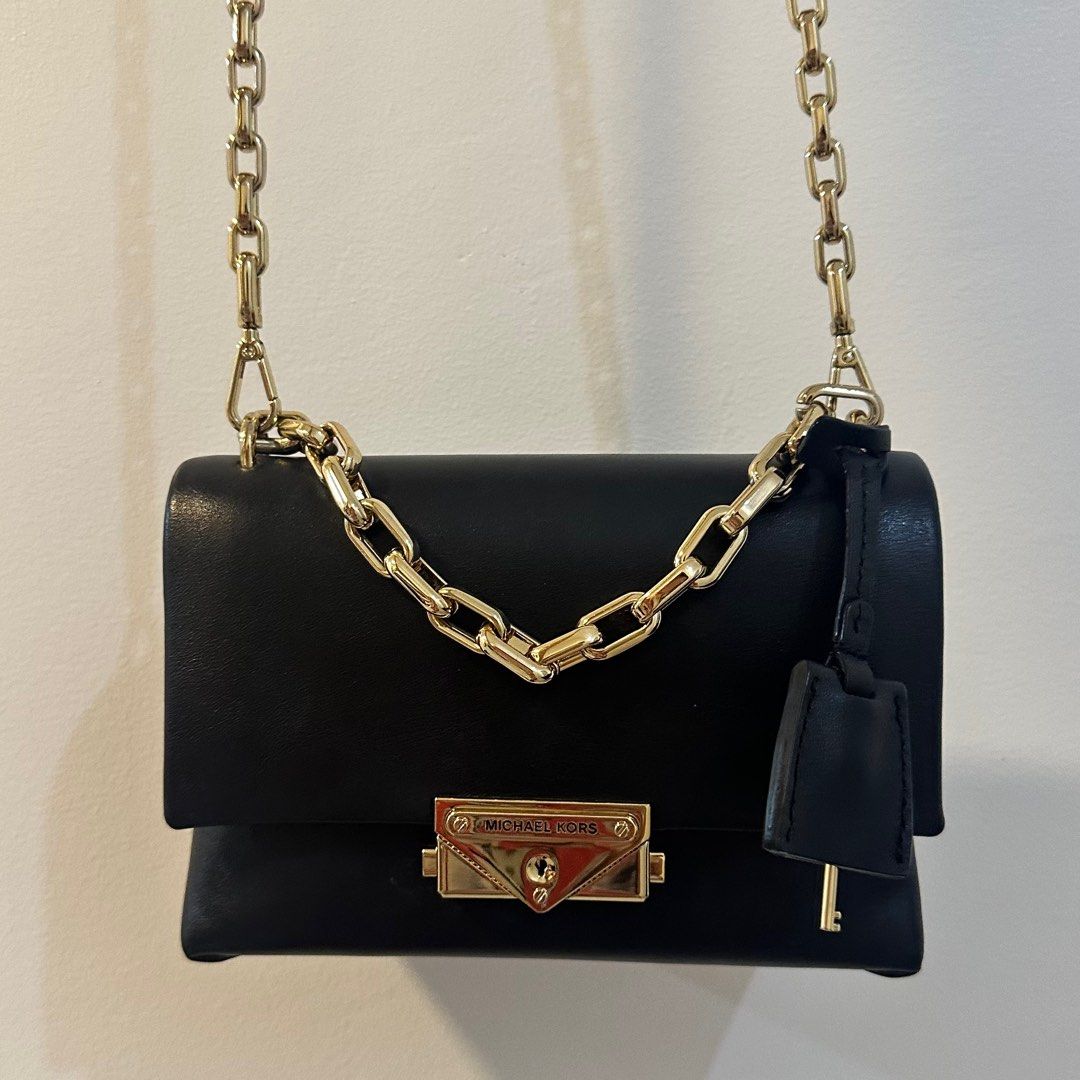 Authentic Michael Kors Cece (Category: Luxury Bags & Wallets) located in Bacoor. Submitted by conclaseph (Listing ID 1355578288, Image 1). Description: 🌸 Authentic Michael Kors 🌸 Bought in Canada Retail store 🌸 Detachable and adjustable strap (can be worn as shoulder or top handle bag) 🌸 Inclusion: dust bag and paper bag 🌸 Slightly nego for sure buyers.