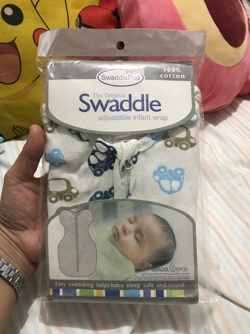 Swaddle Pod The Original Swaddle Adjustable Infant Wrap (Category: Babies & Kids Fashion) located in Quezon City. Submitted by jandia0820 (Listing ID 1355544025, Image 1). Description: Srill available- The Original Swaddle Adjustable Infant Wrap - still available Condition: Almost good kasi once or twice lang nagamit ng anak ko. Maganda sya for newborn but too late na nang nabili ko ito, medyo malaki na sya. Design: Cars 100% Cotton For Newborn 5