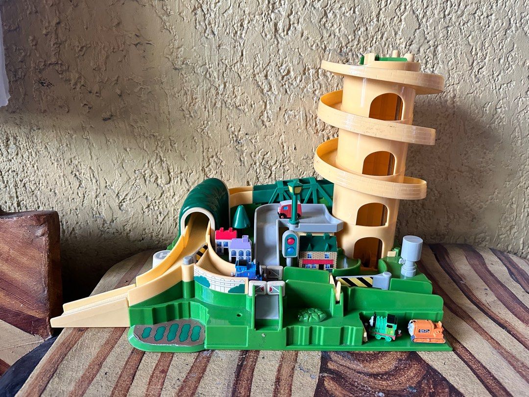 Thomas the train parking playset (Category: Kids Toys) located in Valenzuela. Submitted by kaelstoypalace (Listing ID 1355517843, Image 1). Description: Preloved by my son. Comes with 4 mini trains. AS IS CONDITION .
