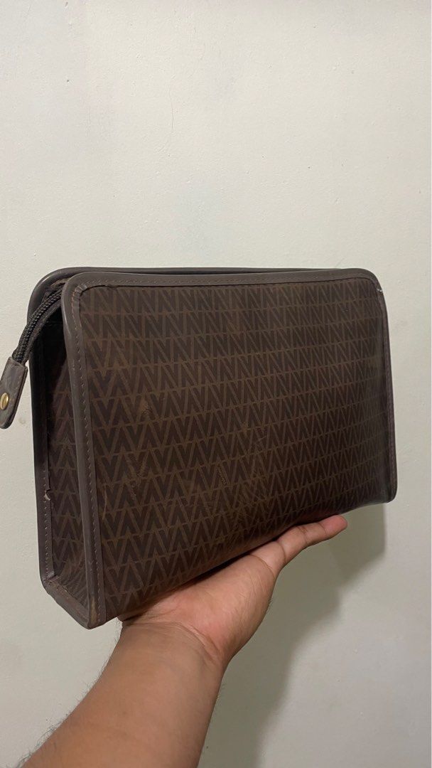 Valentino Clutch Bag (Category: Belt bags, Clutches and Pouches) located in Manila. Submitted by soall (Listing ID 1355621476, Image 3). Description: Mario Valentino Clutch Bag 100% Authentic bought in Japan Leather For men (Unisex also) Condition: 8.5/10 (Faded on some bottom part, overall great condition, kindly see actual photos) Good for formal attire or everyday use. Very presentable.