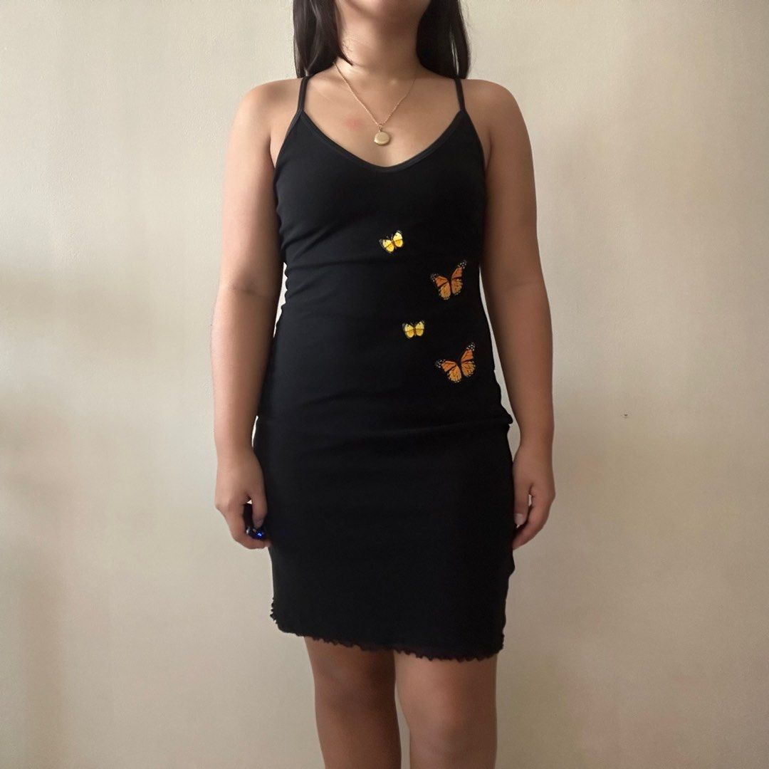 black dress with butterflies (Category: Dresses) located in Calamba. Submitted by krustykren (Listing ID 1350910773, Image 2). Description: bust up to 34” / waist up to 30” / hips up to 38” / length 33” — FAQ - JRS Express delivery (from Laguna); GGX and SDD (from MNL) - MOP: BDO, GCash - 3 days max reservation - no rush shipping.