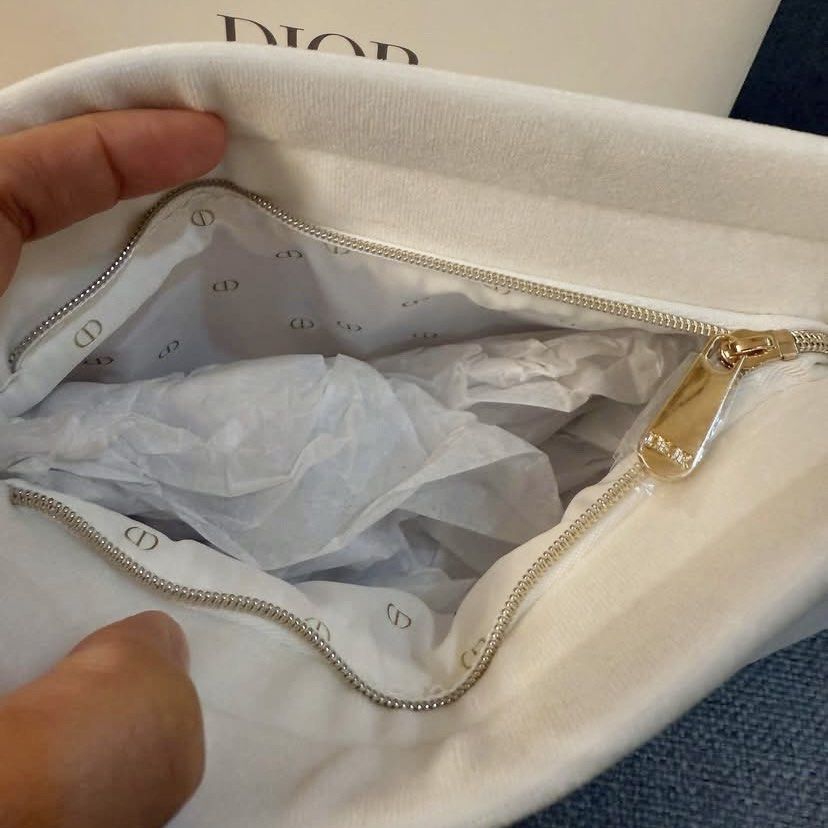Christian Dior Pouch (Category: Luxury Bags & Wallets) located in Pateros City. Submitted by omniabeautyph. (Listing ID 1351030848, Image 2). Description: CD Complimentary Velvet Pouch Brand new w box fits Iphone Pro Max.